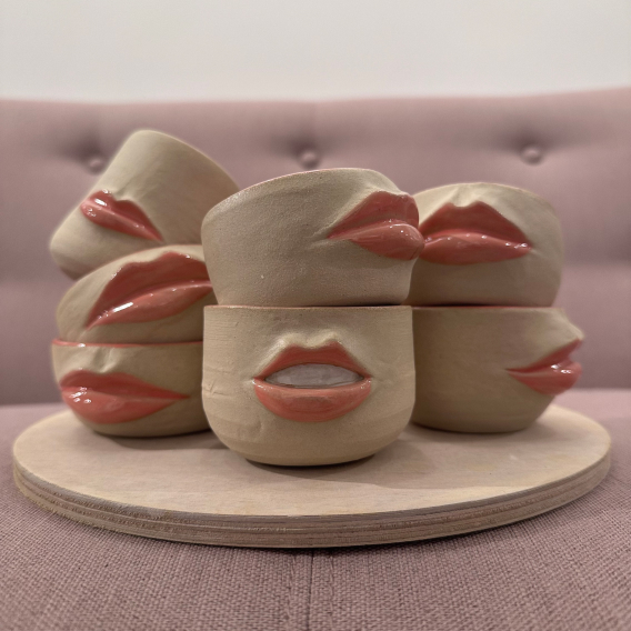 A collection of stoneware bowls with lips